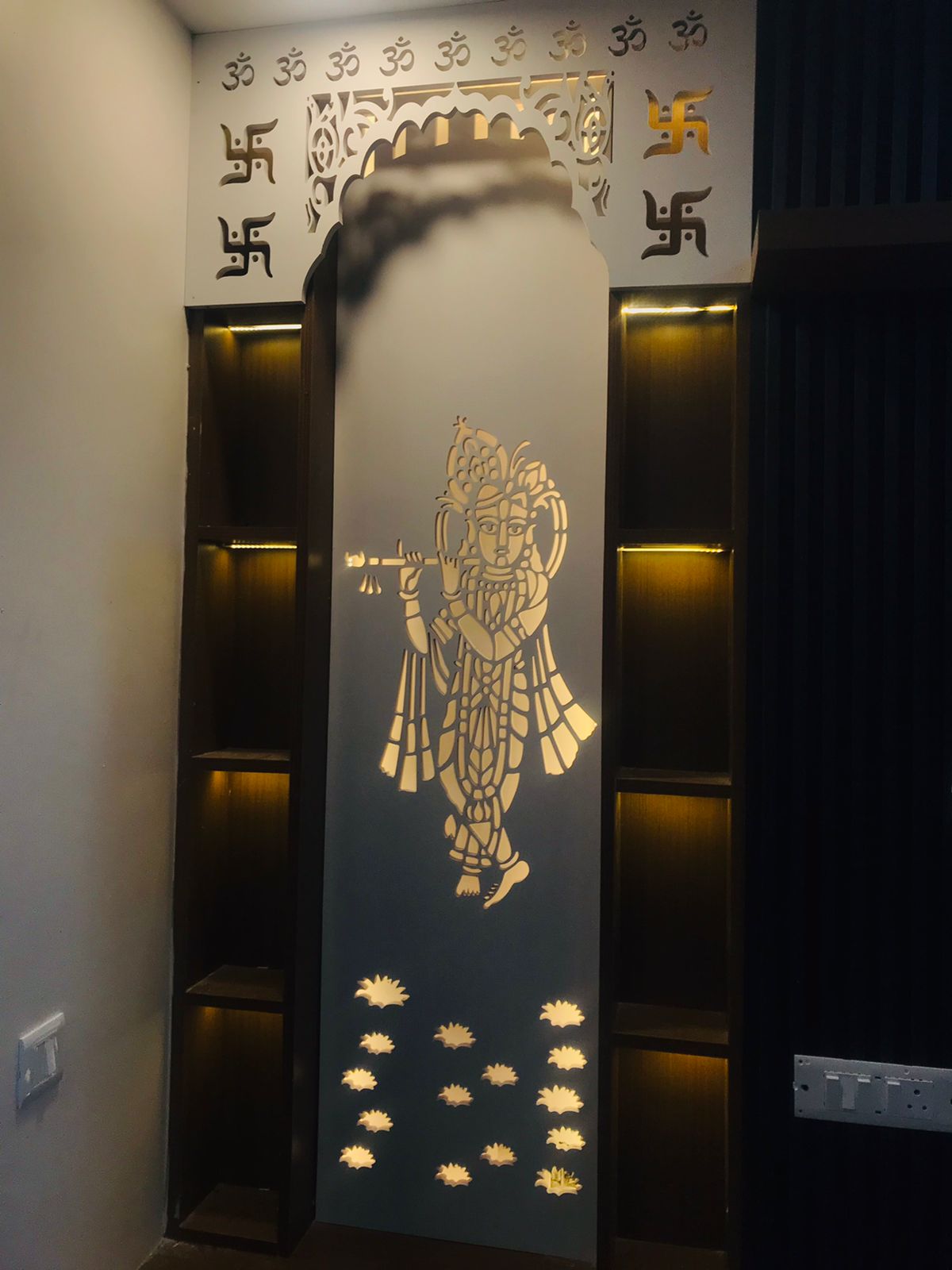 Decorative puja panel with shelves